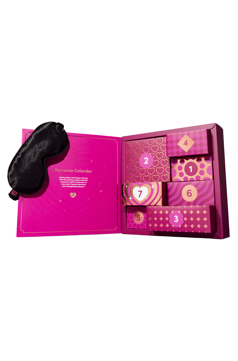 Open 7 day advent calendar with the satin blindfold beside it