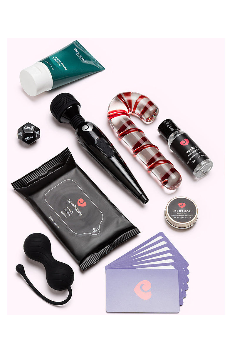 Wand, glass candy cane dildo, kegel balls, lube, massage oil, menthol balm, wipes, dice and card game