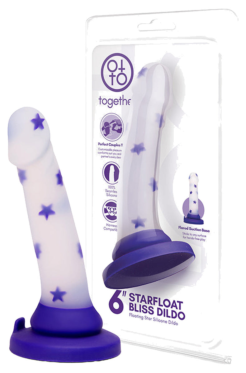 Clear purple star dildo next to its retail box