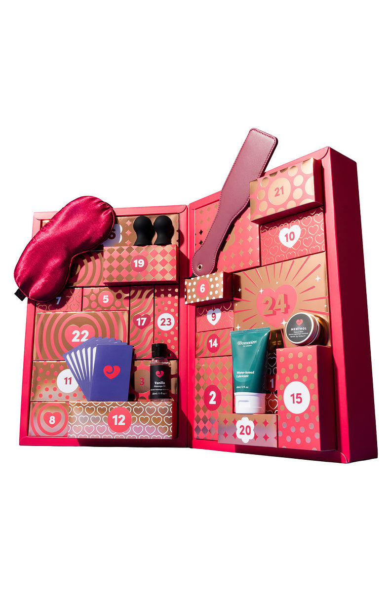 Open couples advent calendar with blindfold, paddle, card game and lube in the doors
