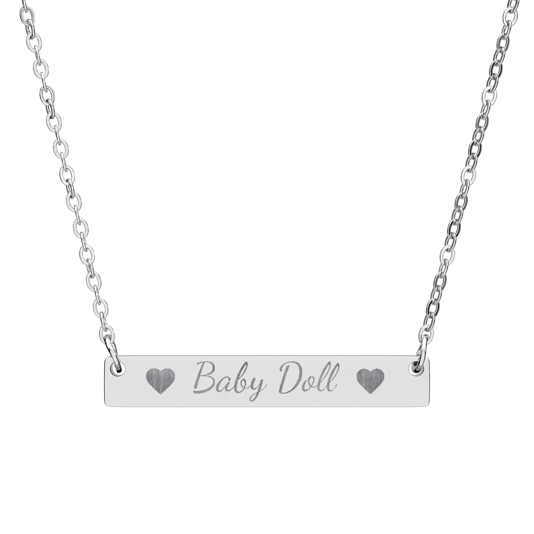 Silver necklace with a bar pendant engraved with 'Baby doll' on a white background