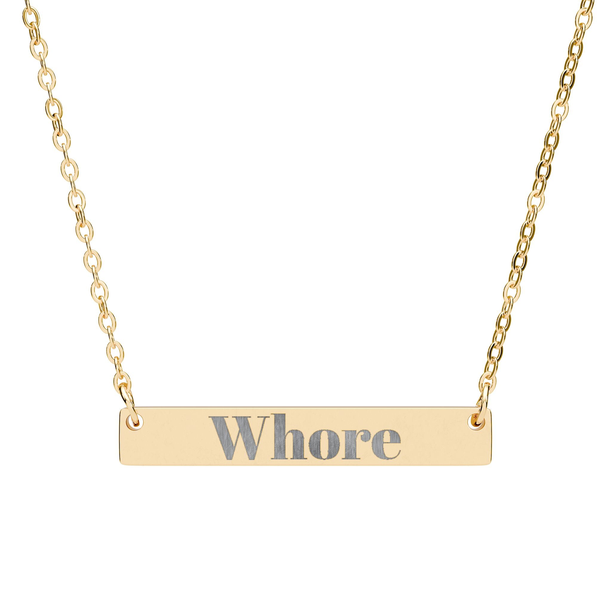 Gold necklace with a bar pendant inscribed with the word 'Whore' on a white background