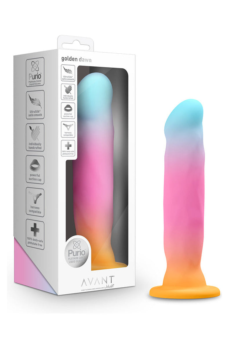 Aqua, pink and gold ombre dildo next to its retail box