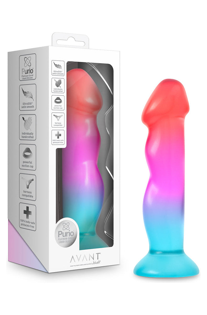 Coral, pink and aqua ombre dildo next to its retail box