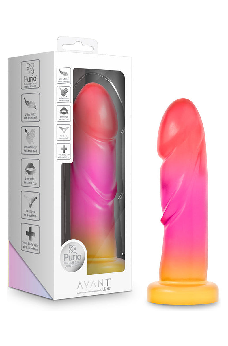 Coral, pink and gold ombre dildo next to its retail box