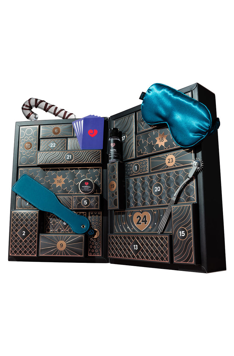 Open luxury advent calendar with the candy cane dildo, blindfold, paddle and cards in the doors