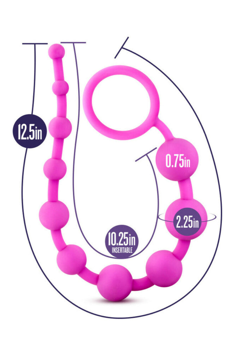 Pink silicone anal beads with size diagram: 12.5 inch length, 10.25 inch insertable, 0.75 inch bead width.