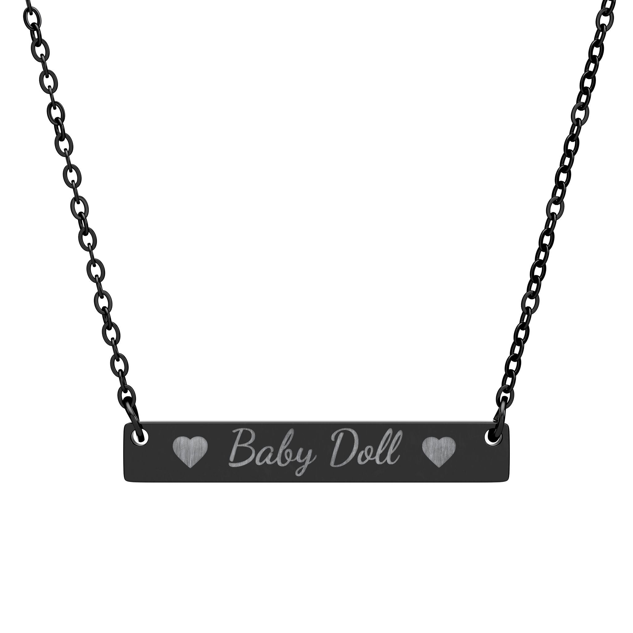 Necklace with a bar pendant engraved 'Baby Doll' on a white background