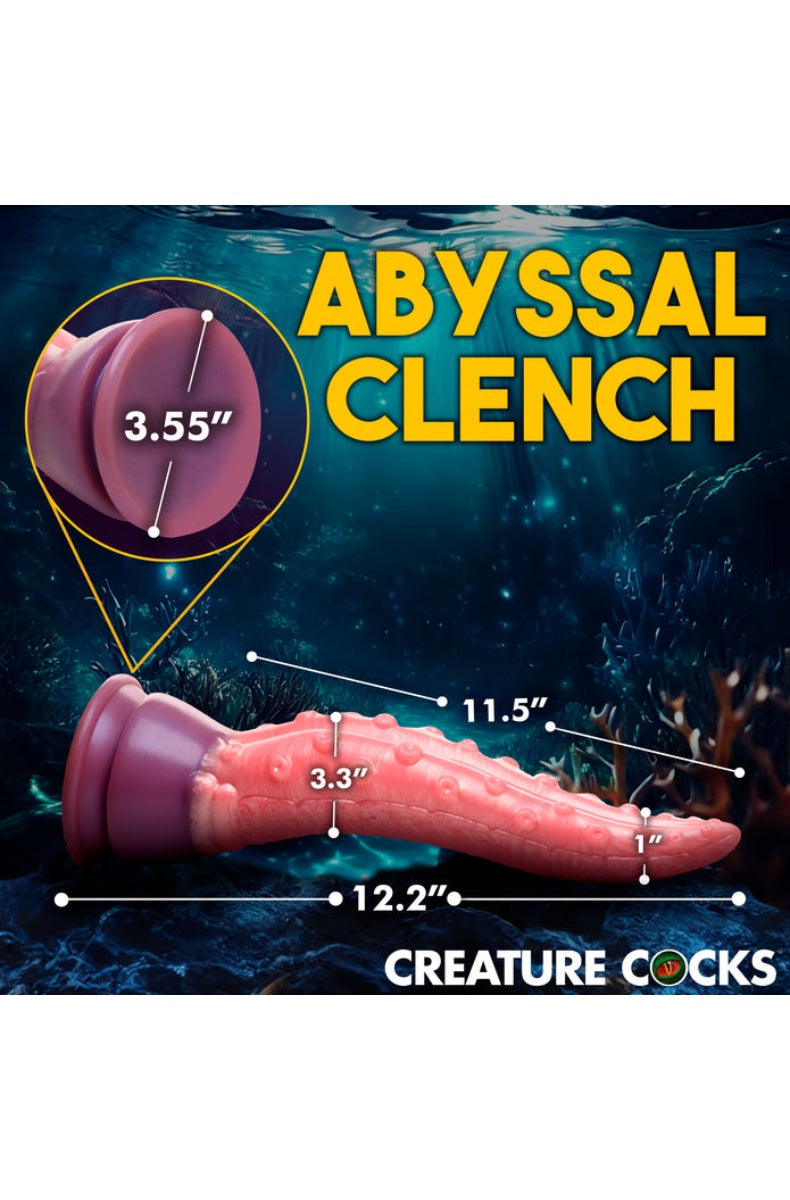 Side view of pink dildo with dimension measurements showing 12.2 inch total length and 3.55 inch width