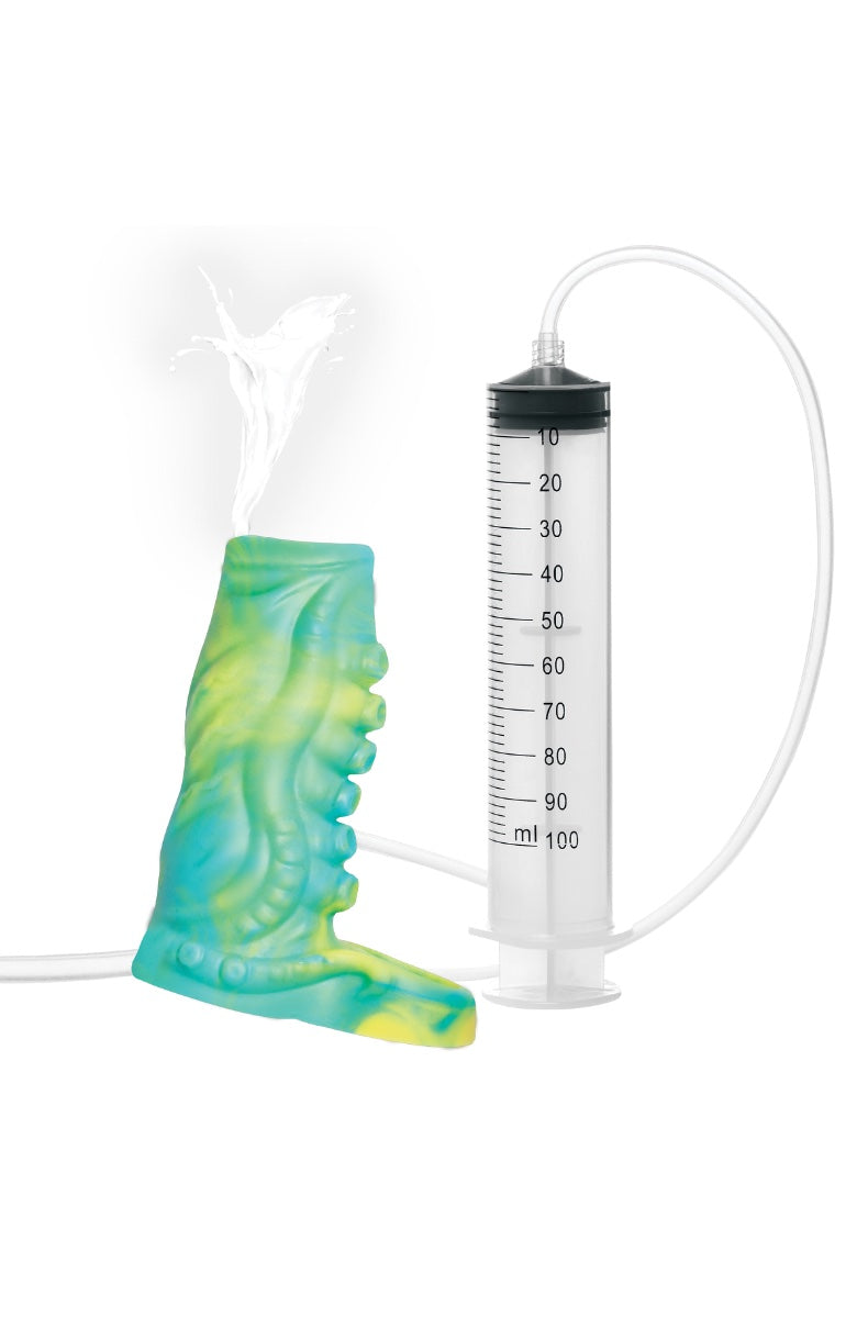 Clear 100ml syringe connected to teal-green tentacle textured sleeve via clear tubing against white background