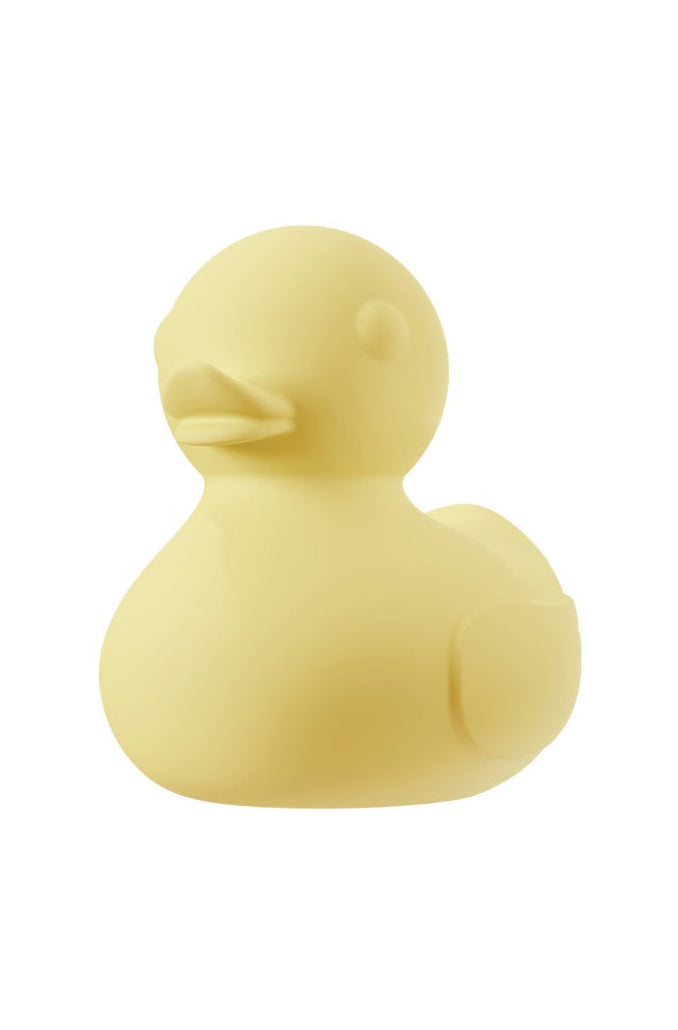Back view of yellow duck vibrator showing rounded body and tail detail