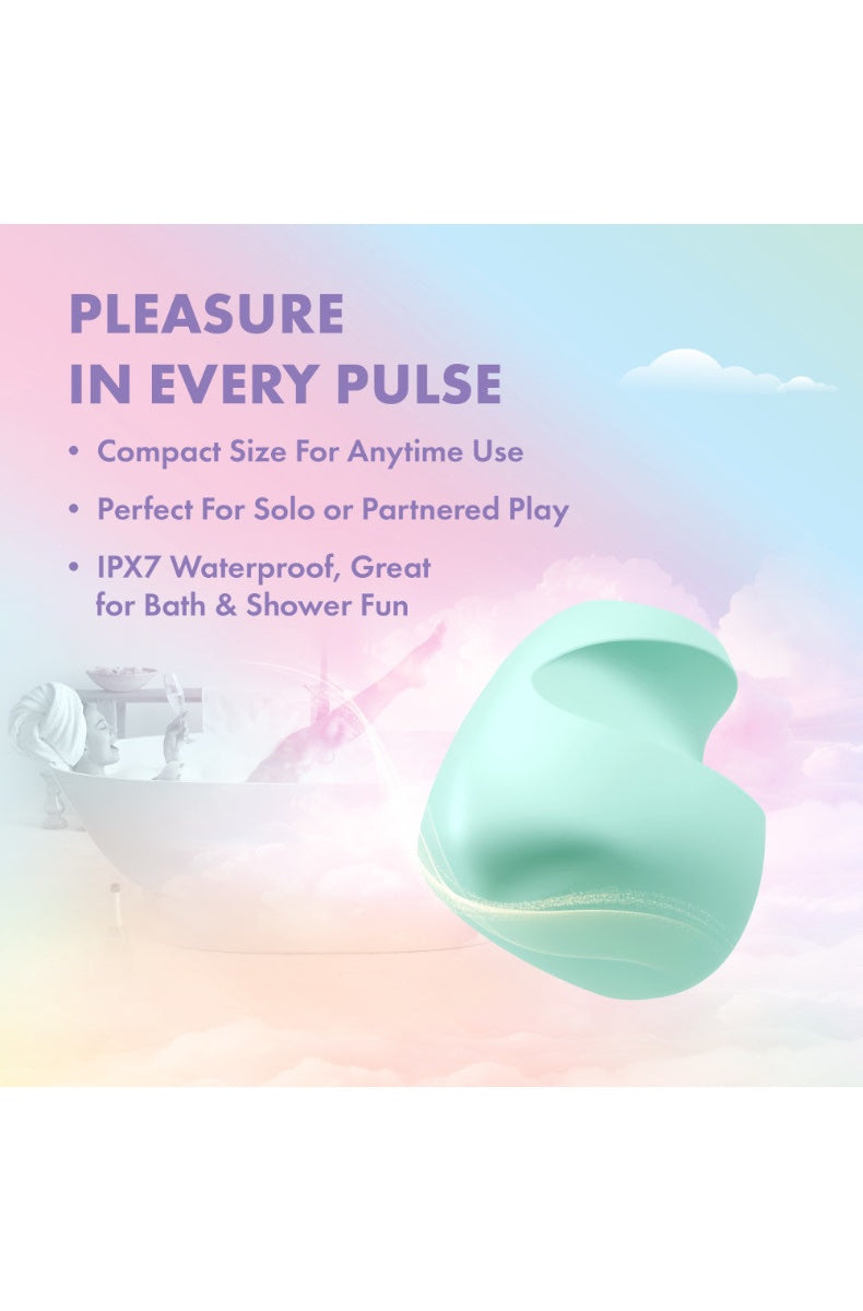 Lifestyle shot showing mint green clitoral vibrator in bathtub setting with dimension measurements