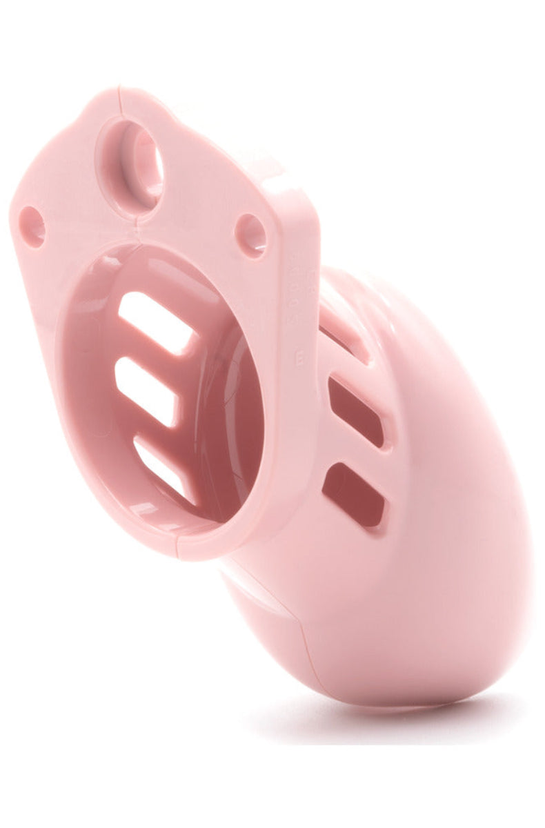 Pink chastity cage seen from the base showing the guide-pin holes, locking holes, and vent slots, on white.