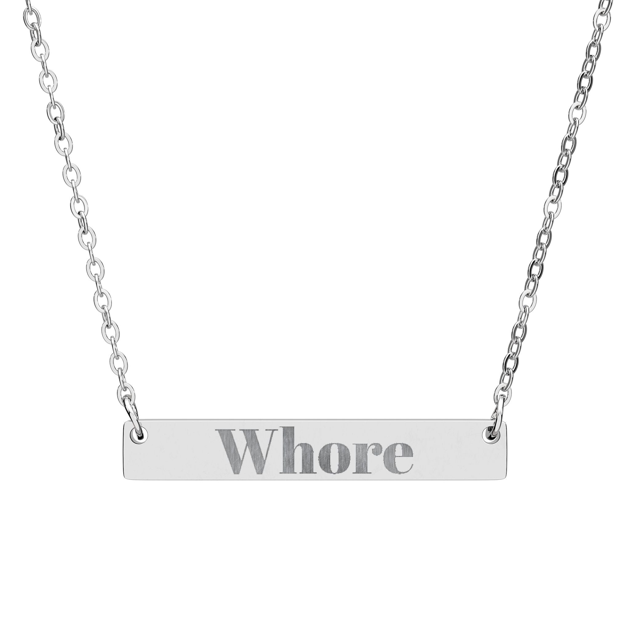 Silver necklace with a bar pendant engraved with the word 'Whore' on a white background