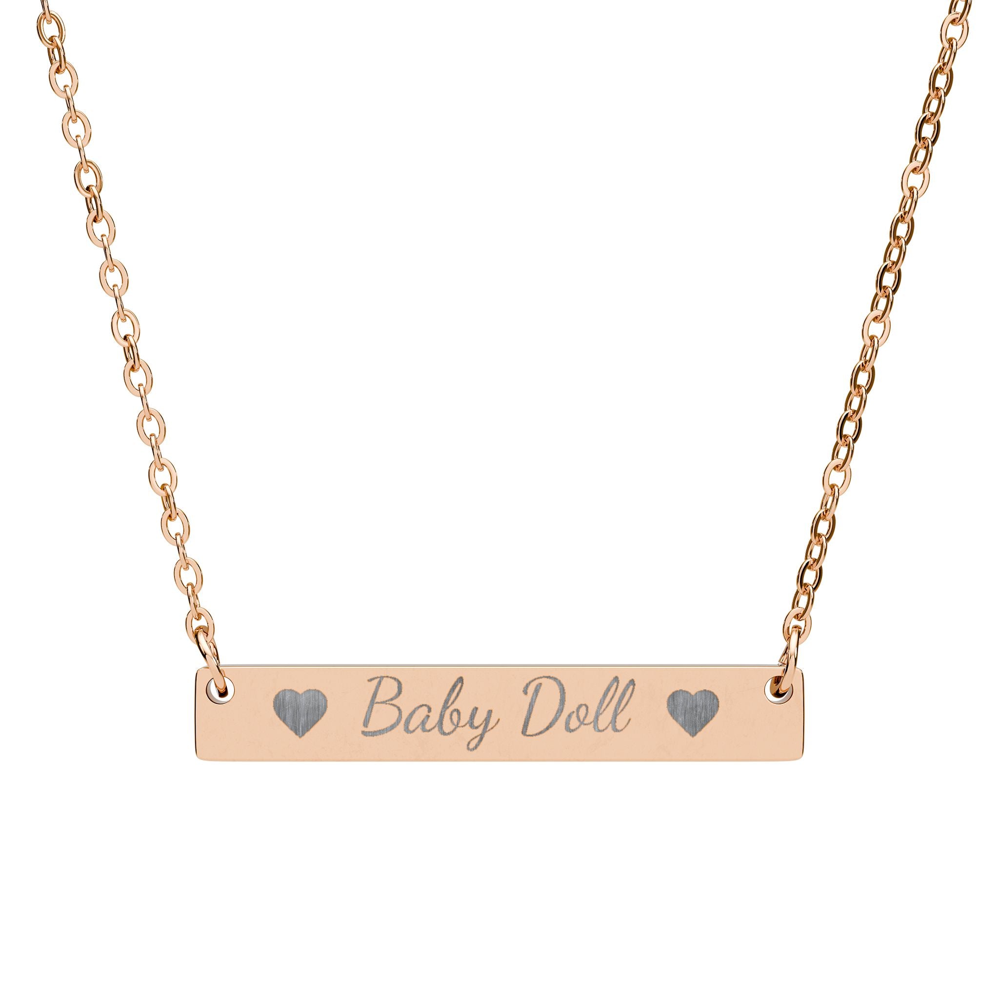 Rose gold necklace with engraved name ''Babydoll' on a white background