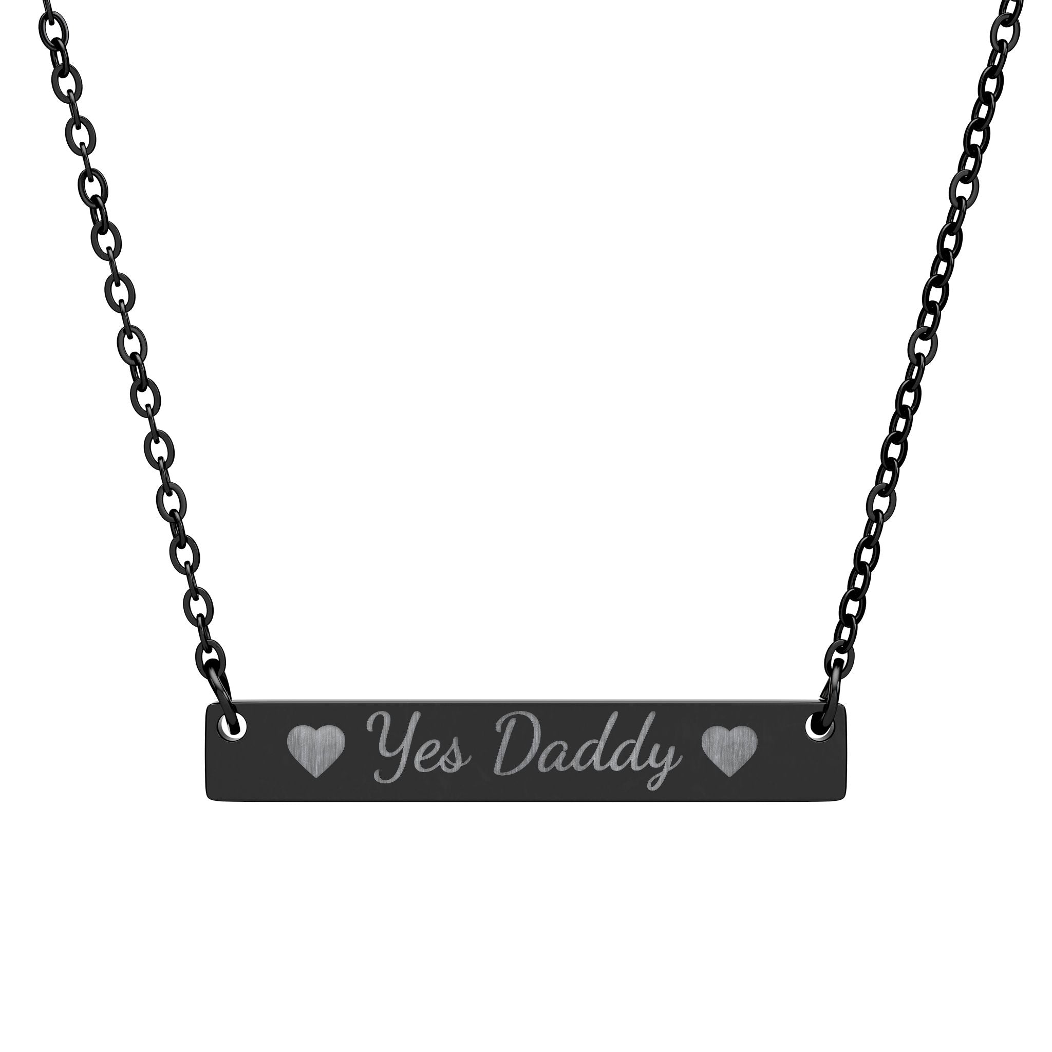 Necklace with 'yes daddy' pendant on a white background