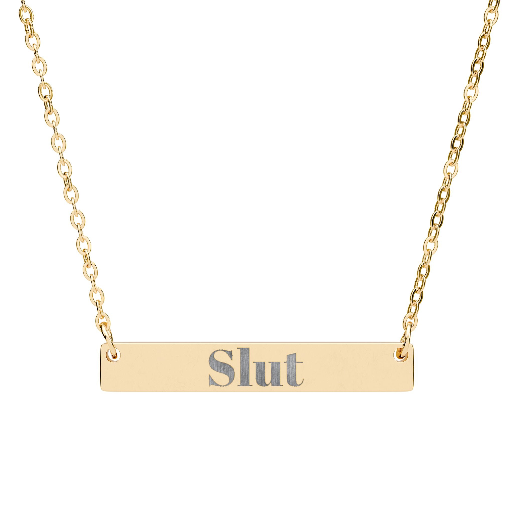 Gold necklace with 'Slut' pendant on a white background