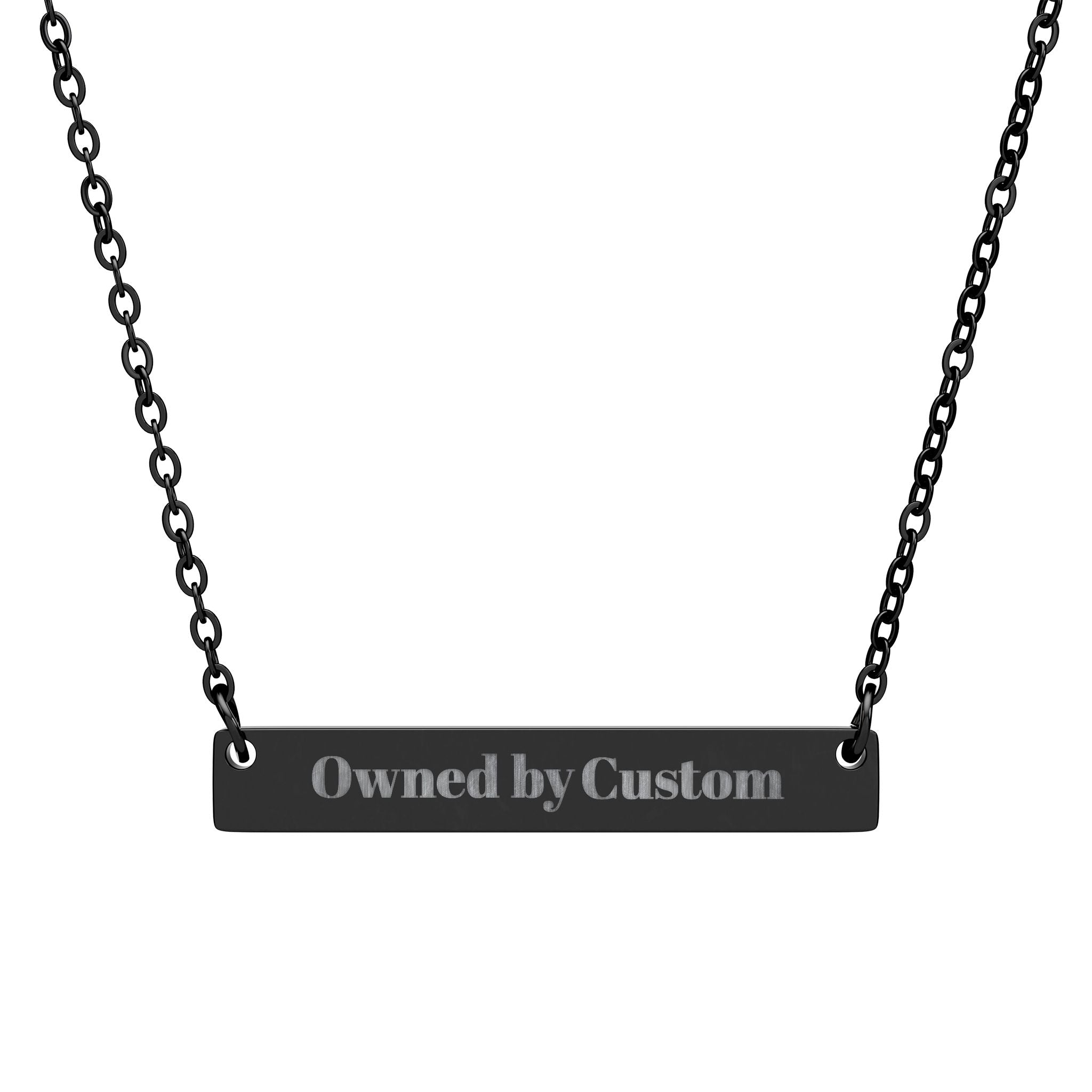 Black necklace with 'owned by custom' pendant on a white background