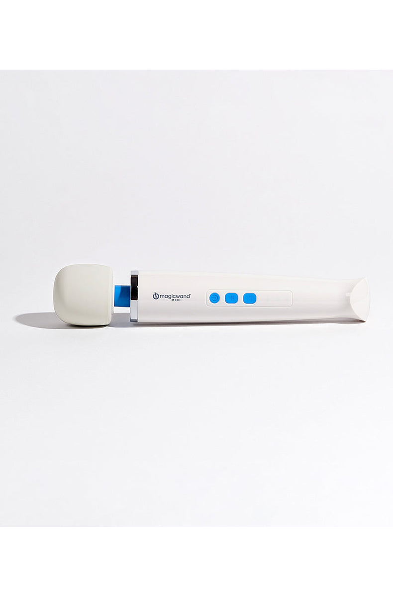 Magic Wand Mini lying on its side on white background showing slim profile and head