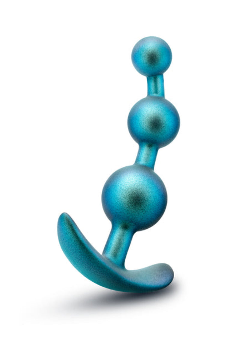 Teal silicone anal plug at an angle, three progressive beads with the curved anchor base at left, on white background.