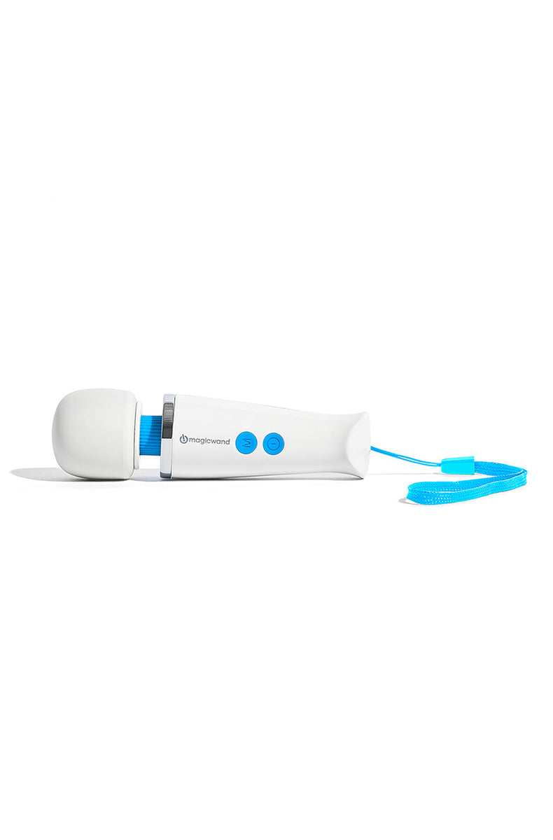 Magic Wand Micro handle close-up showing the blue M and O push-button controls and Magic Wand branding.
