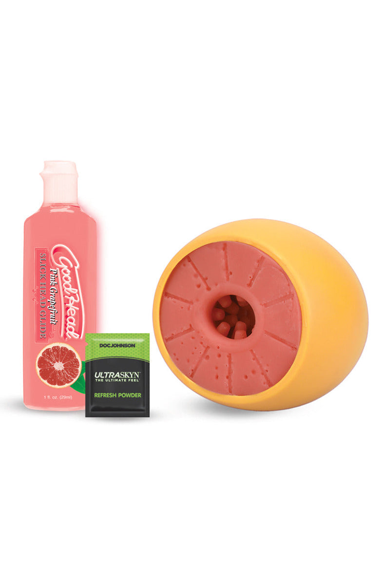 Yellow grapefruit ULTRASKYN open-ended stroker with pink textured interior, GoodHead glide bottle, refresh powder packet.