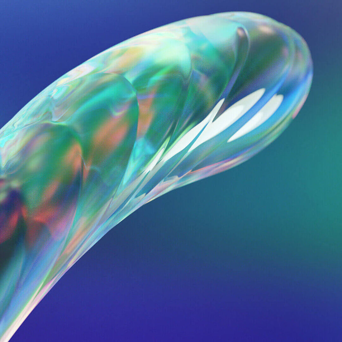 Macro close-up of the ribbed glass surface with rainbow iridescence in blue, green, and purple.