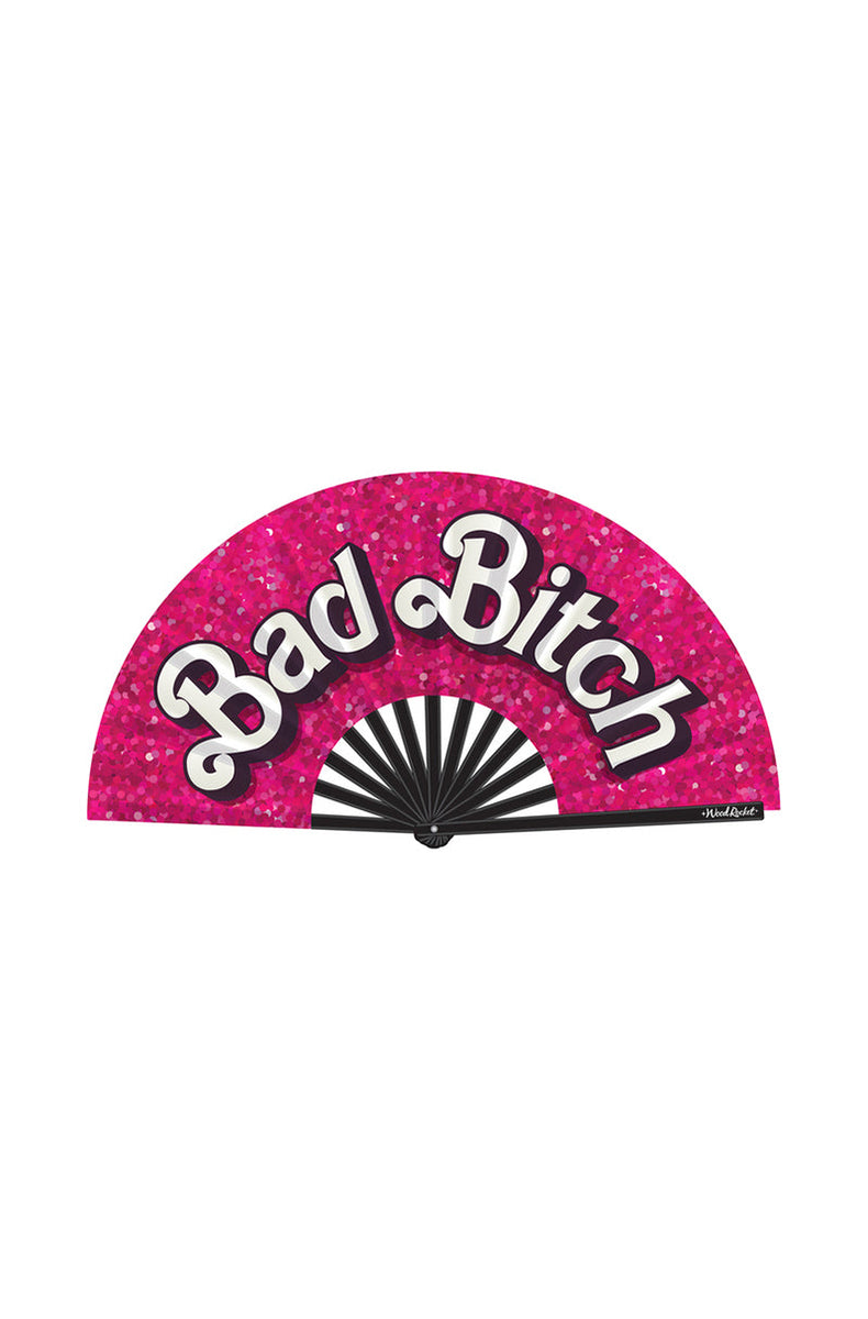 Open pink-glitter satin folding hand fan with Bad Bitch in white cursive lettering and a black bamboo rib frame.