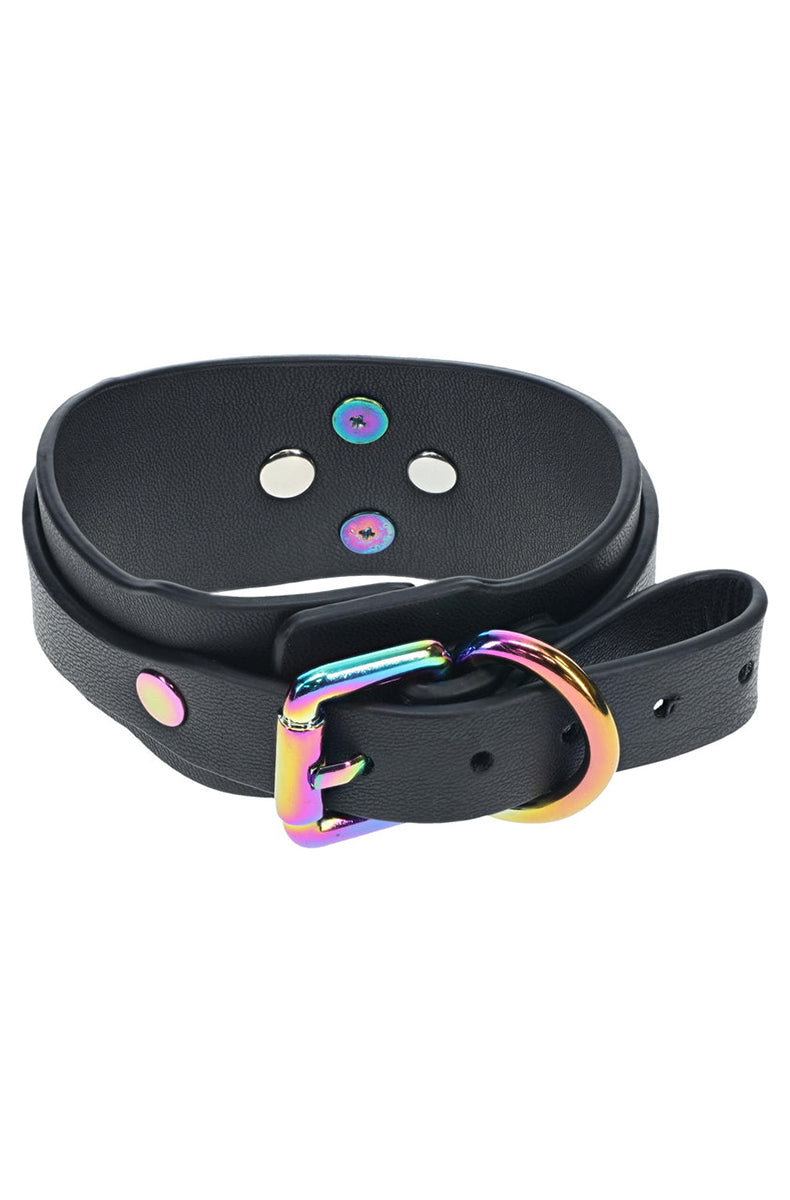 Flat layout of two black bonded leather ankle straps with rainbow metal buckles and pink-tinted rivets.