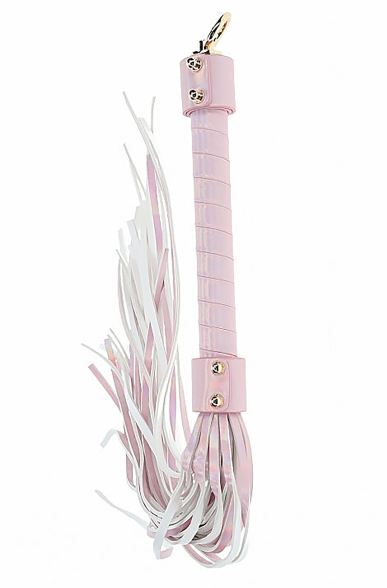 Pink iridescent vegan-leather flogger with dozens of pink and white falls on a wrapped pink handle with gold hardware.