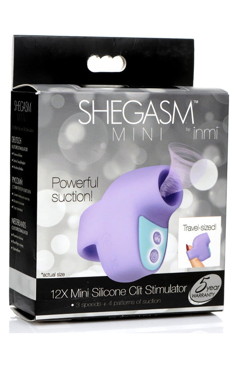 Purple silicone Shegasm Mini air-pulse finger vibrator with finger loop and rounded suction tip.
