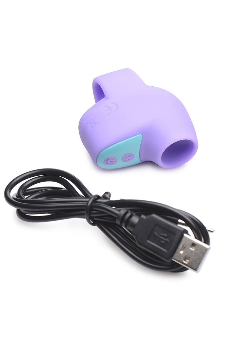 Shegasm Mini finger vibrator with USB charging cable in retail packaging.