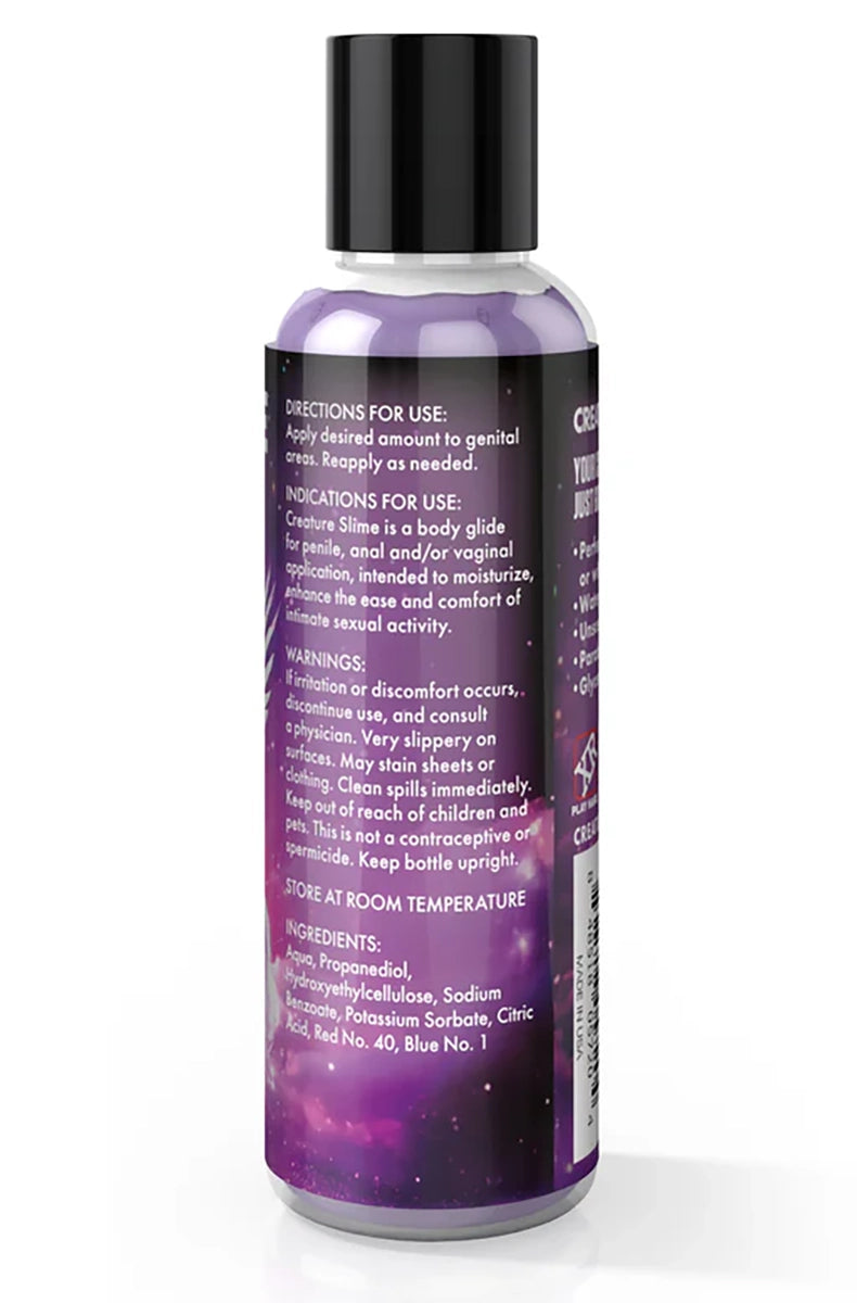 Side angle of Creature Slime purple lubricant bottle showing 4 fl oz / 118 mL.