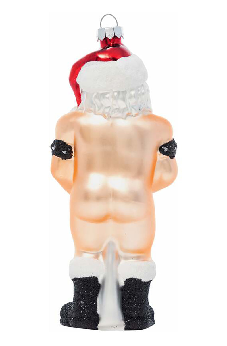 Side view of hand-blown glass Santa ornament showing red and white polka-dot gift box held at the waist.