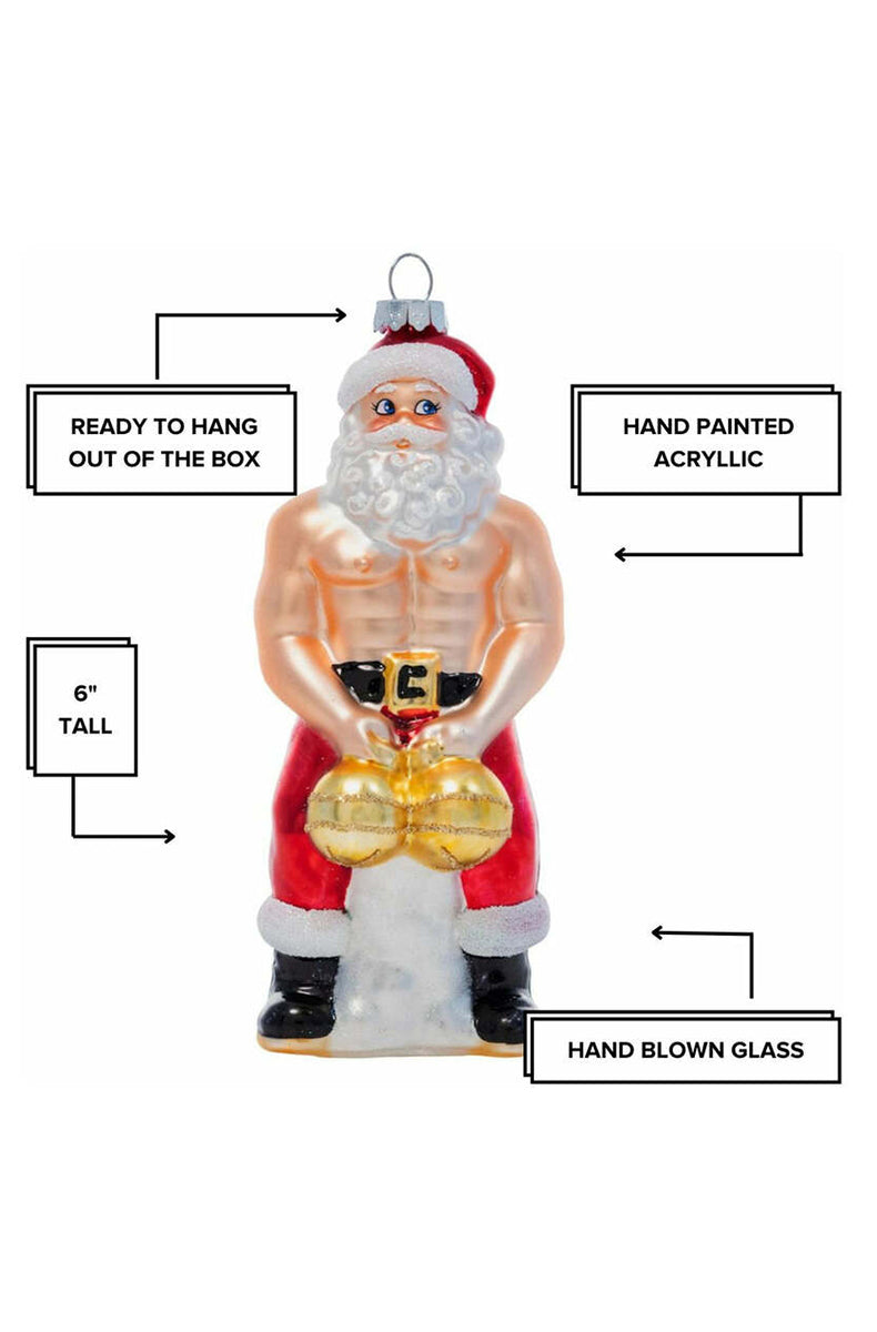 Close-up of gold-glitter ornament balls held by shirtless Santa on hand-blown glass ornament.