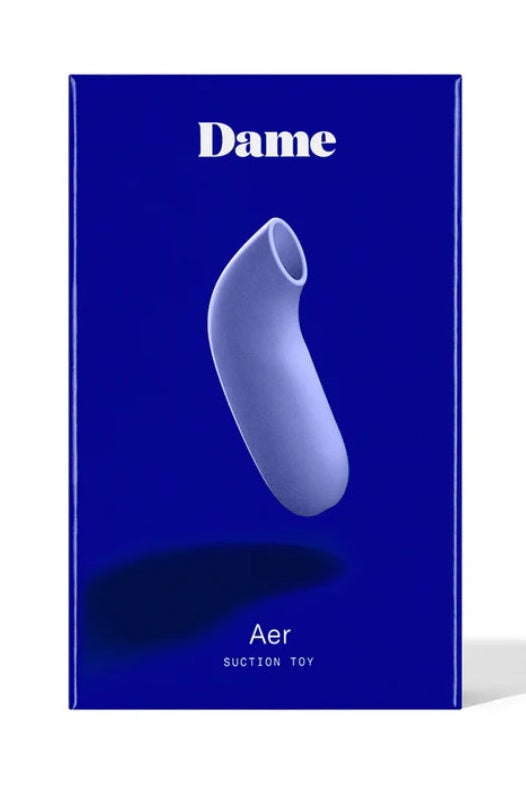 Periwinkle suction toy against blue Dame packaging box