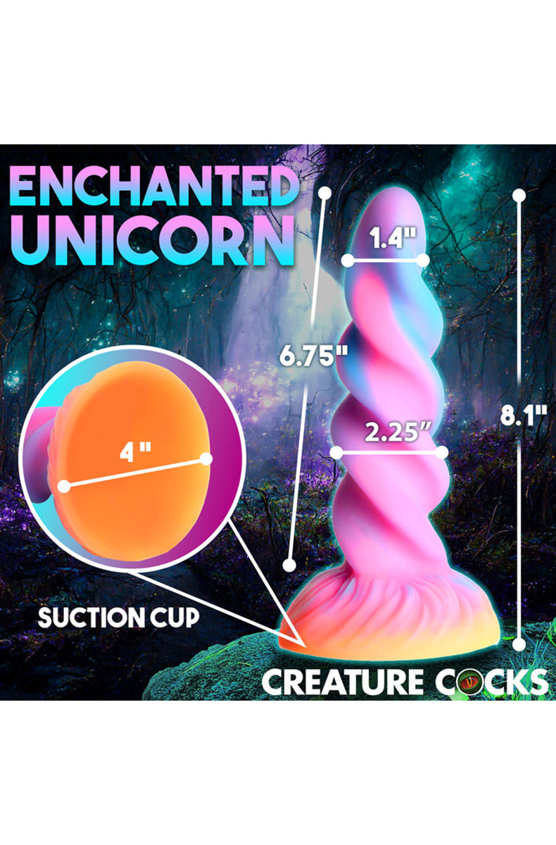 Close-up of unicorn horn glow silicone dildo twisting ridges and tapered tip.