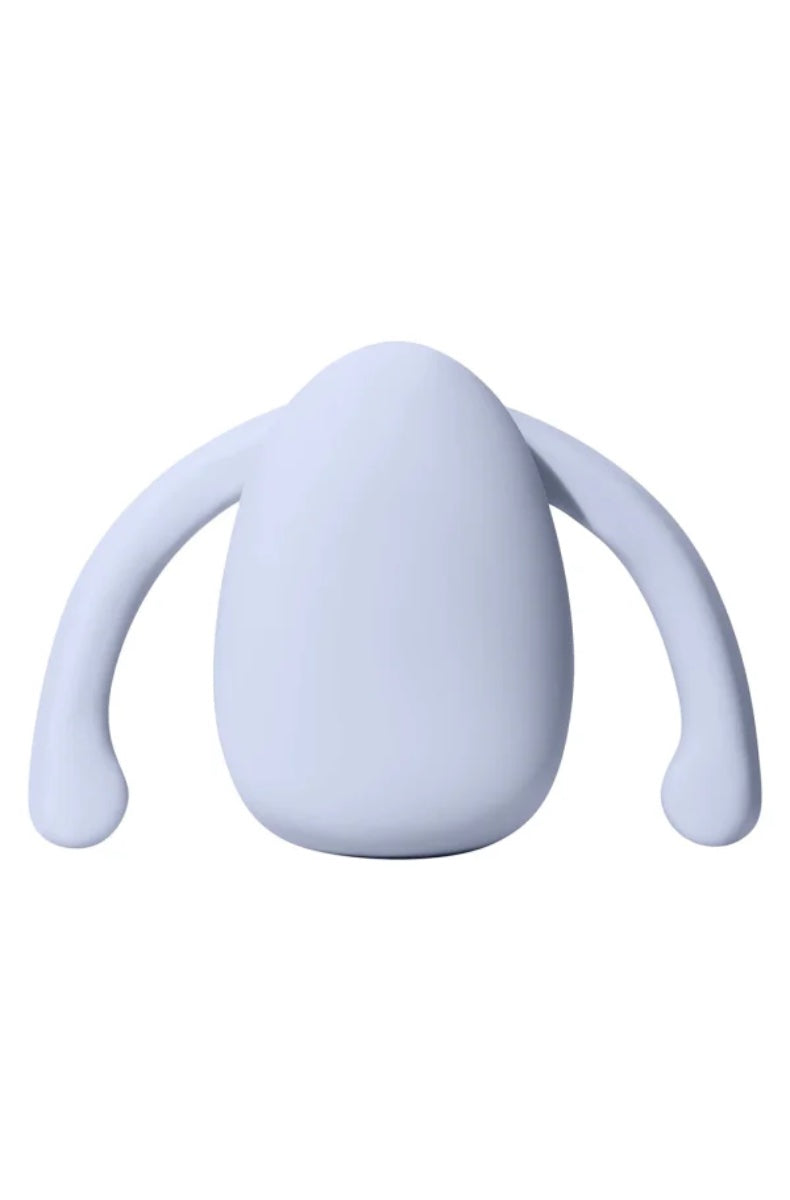 Front view of lavender silicone wearable vibrator with oval body and curved wing extensions