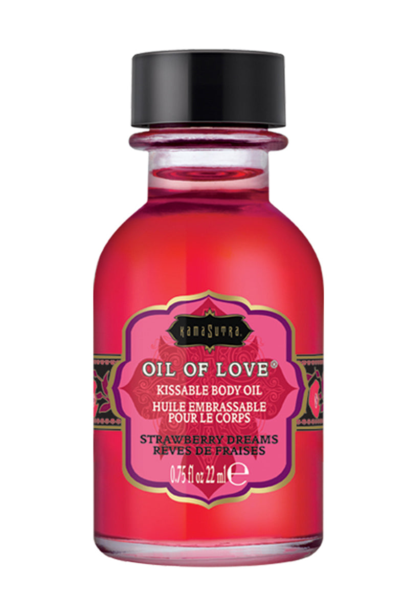 Kama Sutra Oil of Love in Strawberry Dreams bottle with strawberry label on a white background.
