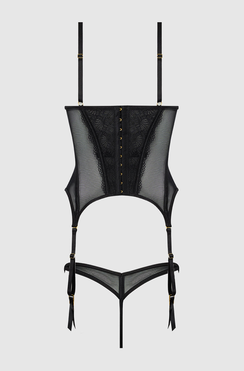Black bustier and g-string laid flat from the back