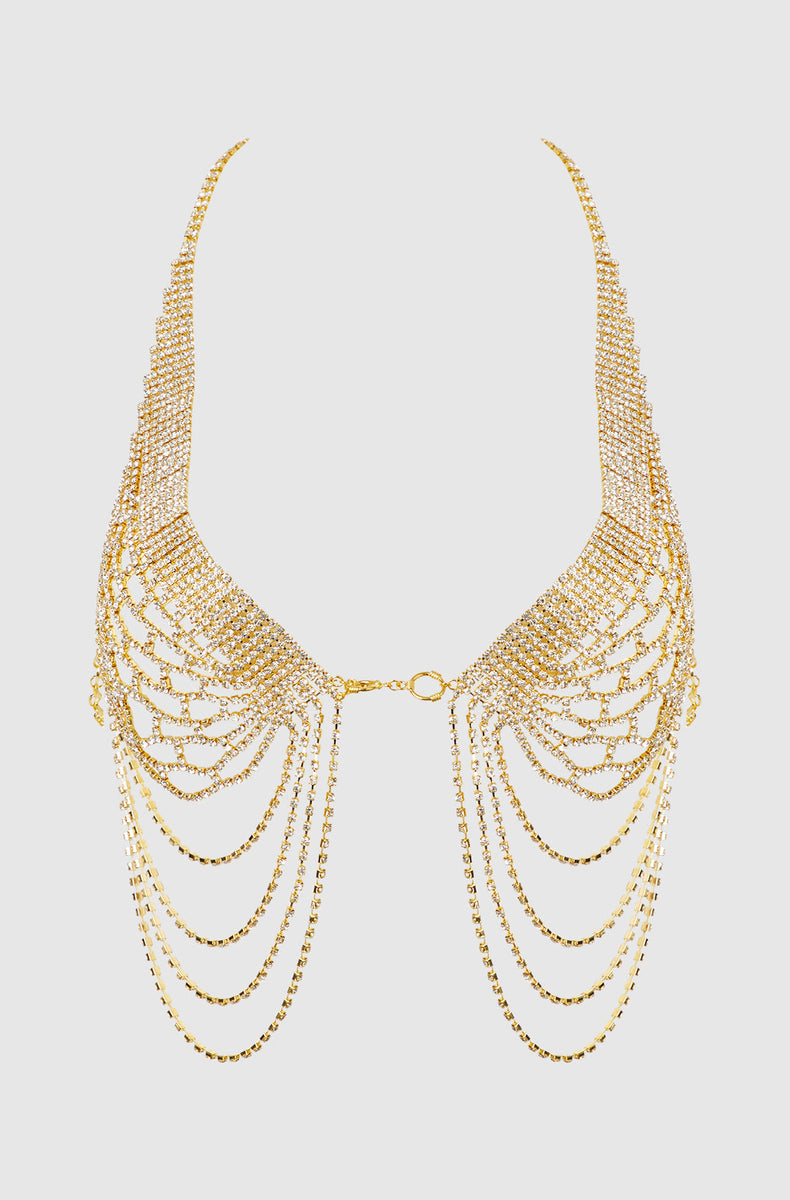 Gold rhinestone net halter bra with cascading strands laid flat