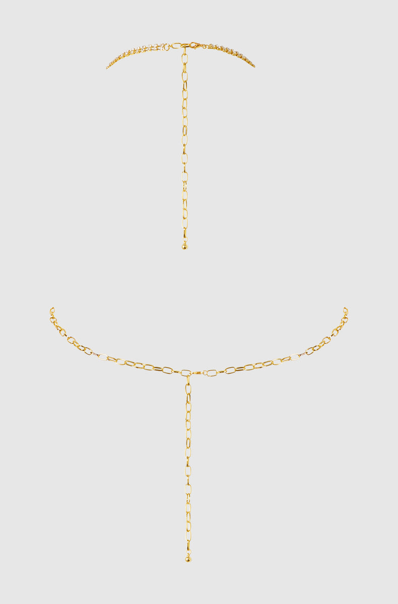 Neck and back chains of the gold rhinestone halter laid flat