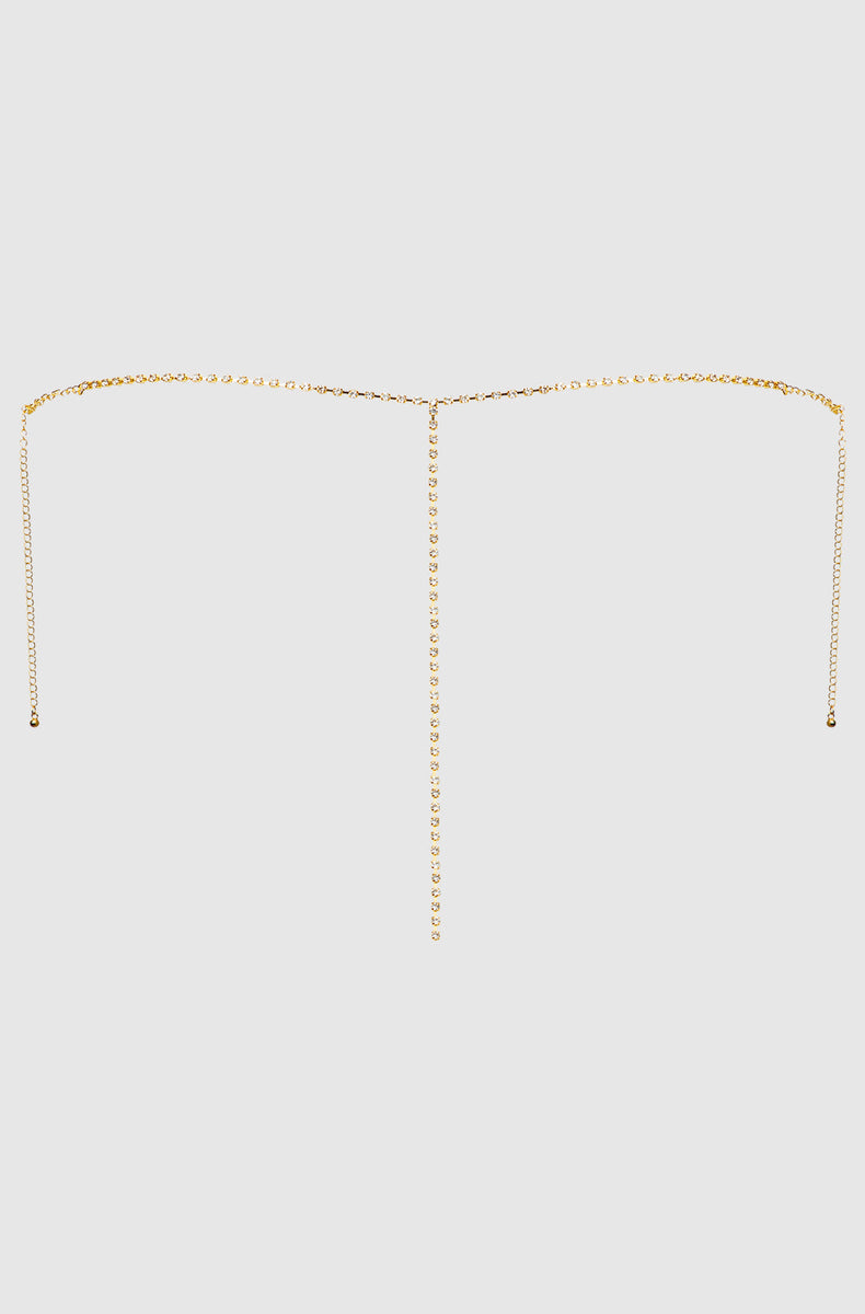 Back of the gold rhinestone g-string laid flat