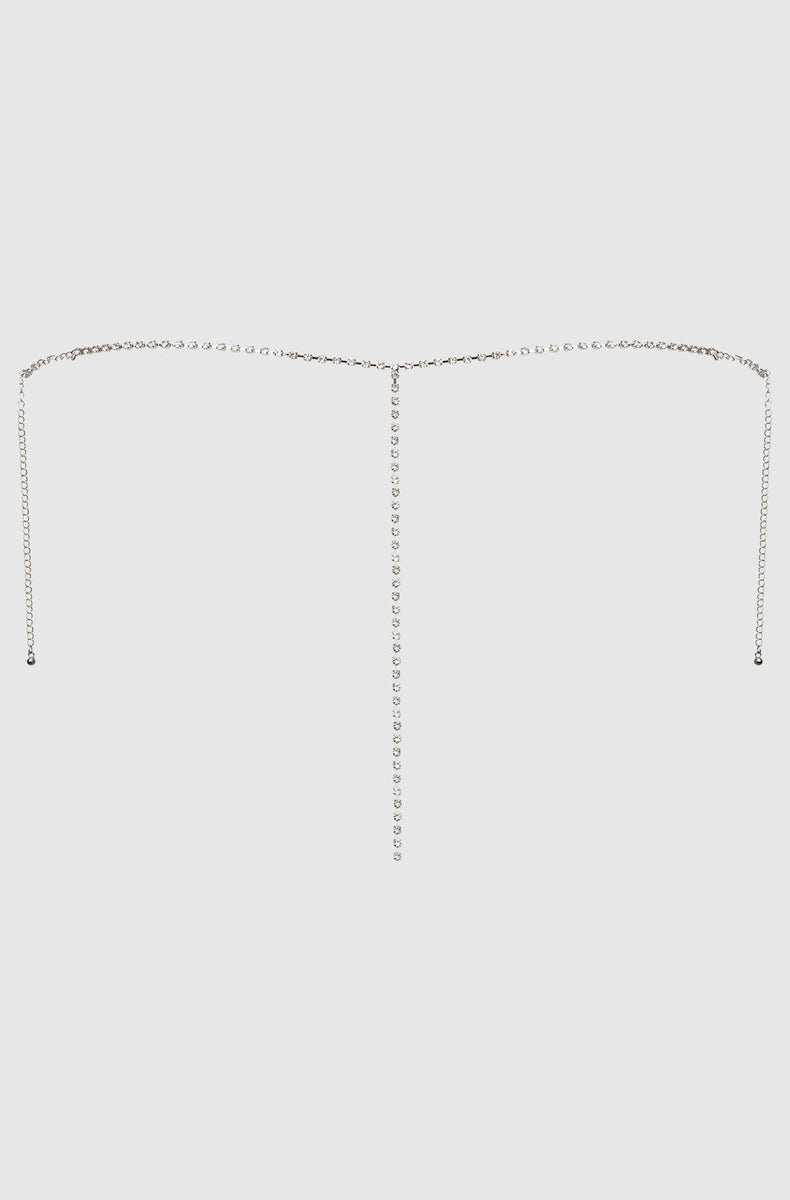 Back of the silver rhinestone g-string laid flat