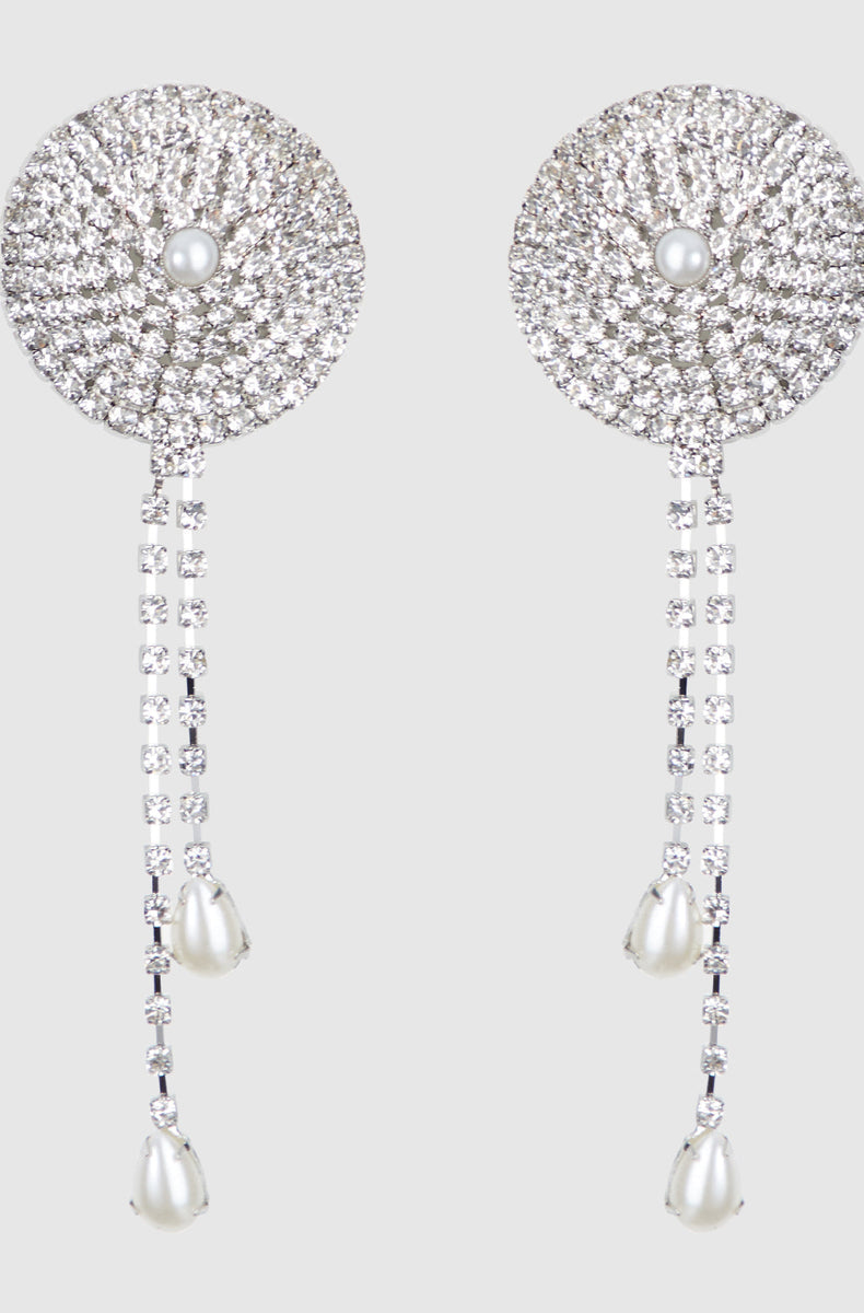 Pair of round silver rhinestone pasties with pearl centers and dangling strands ending in pearl drops