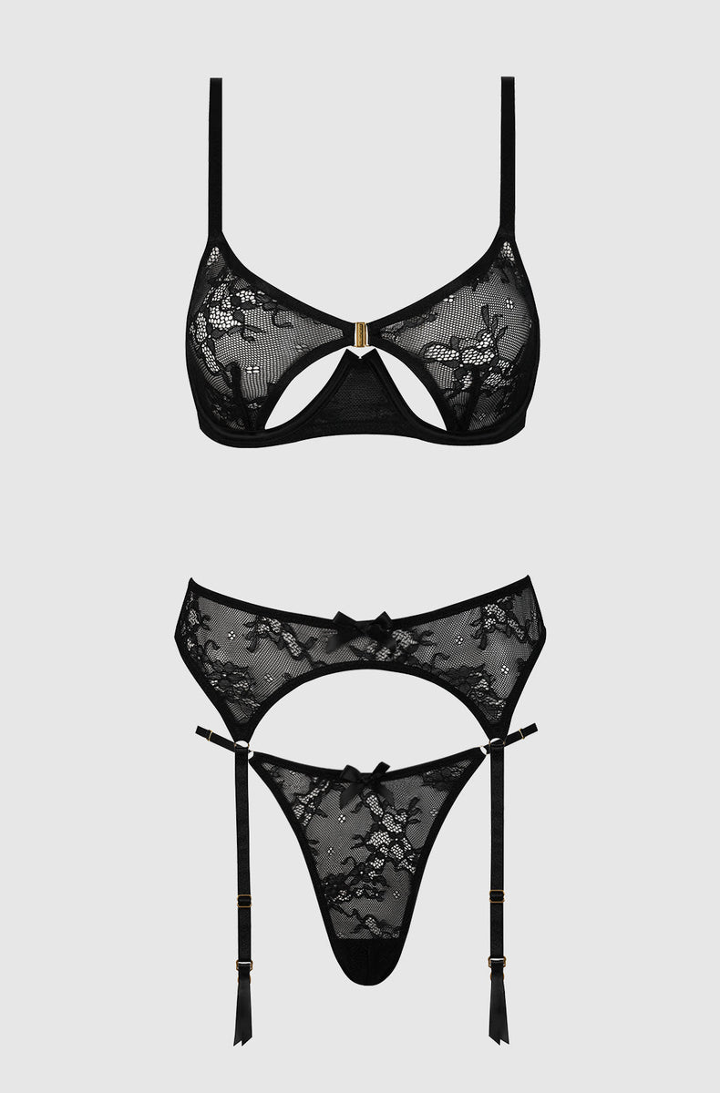 Black lace bra, garter belt and thong laid flat