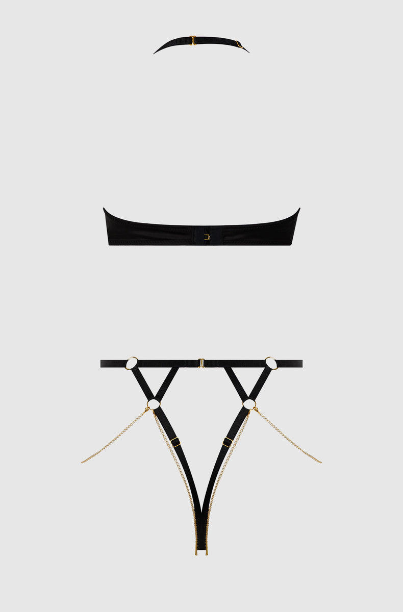 Black harness teddy laid flat from the back
