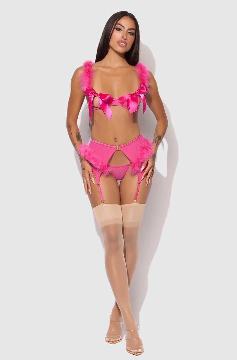 Full length view of the pink marabou bra, garter skirt and g-string set