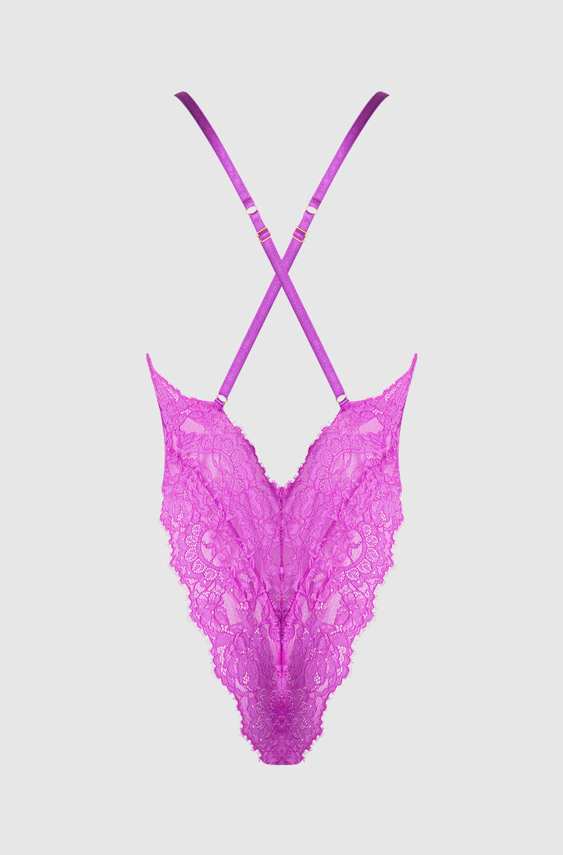 Fuchsia lace bodysuit laid flat from the back with crossed straps