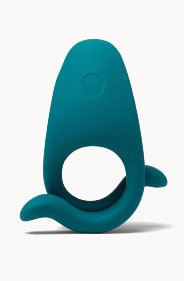 Front view of teal silicone vibrating cock ring with curved top section and flexible side arms